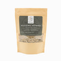 Package of 'Nursing Momma' herbal blend with visible loose leafe inside on a white background